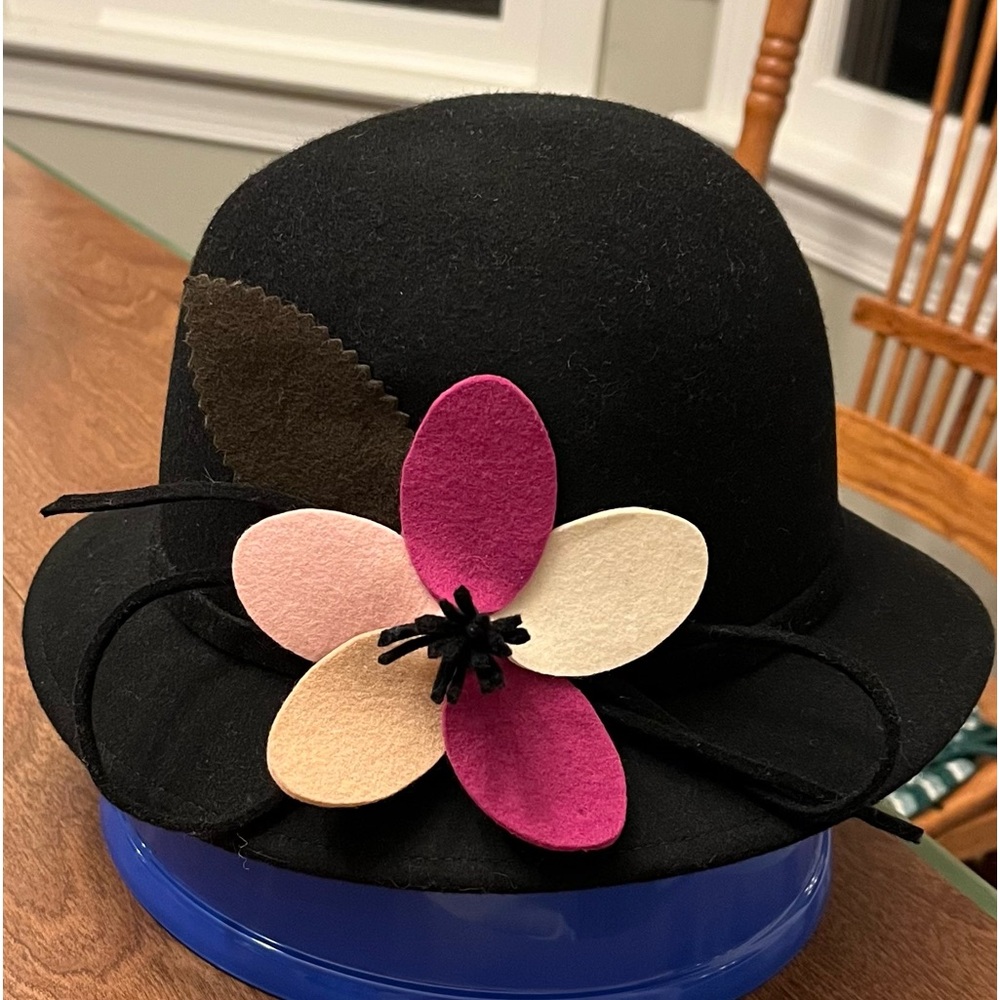 Black wool hat pink brown flower design on one side gently used